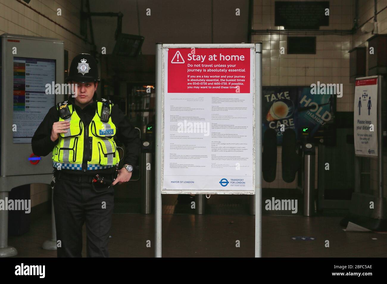London, UK, 2020 Covid- 19 pandemic: A Police officer monitors a central London underground station close to St Thomas' Hospital. Stock Photo