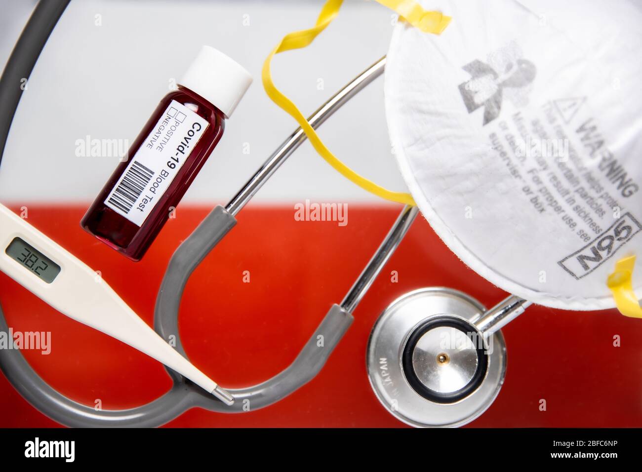 Concept of Coronavirus or Covid-19 pandemic to use as background with Poland Polish country flag and medical blood test, stethoscope, surgical N95 mas Stock Photo