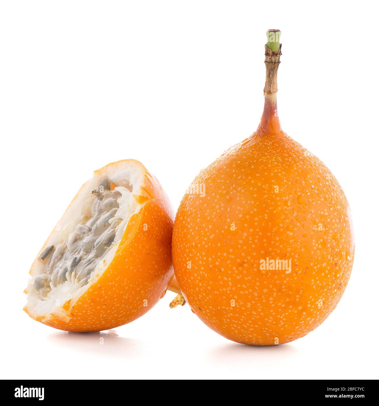 Passion fruit maracuja granadilla on white background Stock Photo - Alamy
