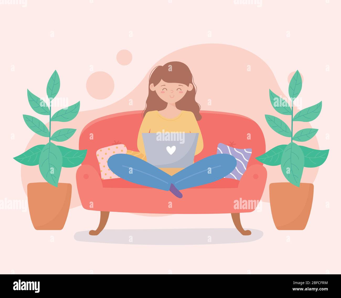 quarantine stay at home, smiling woman with laptop on sofa with potted ...