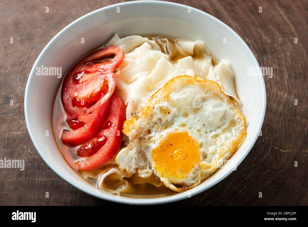 Chinese egg noodles with chopsticks hires stock photography and images