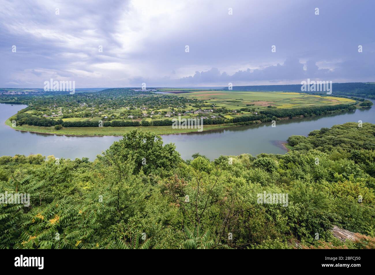 Dniester River, natural border between Moldova and Ukraine - view from hill with Candle Monument in Soroca, Moldova with Ukrainian village Tsekynivka Stock Photo