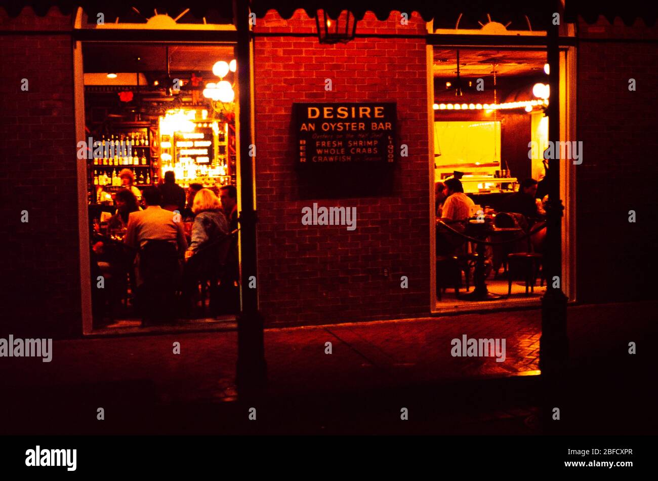 People in oyster bar French Quarter, New Orleans, New Orleans, Louisiana, USA 1989 Stock Photo