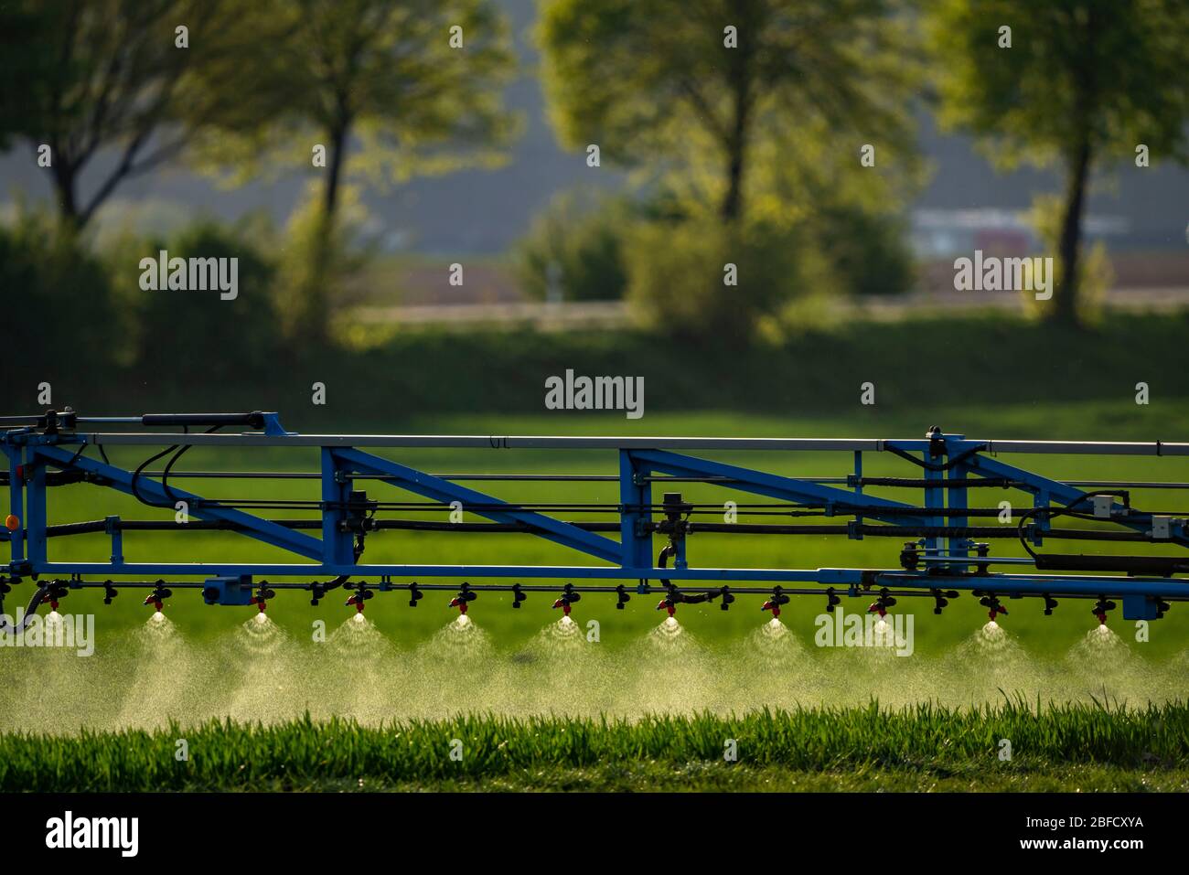 Crop protection products are sprayed in a field near Grevenbroich