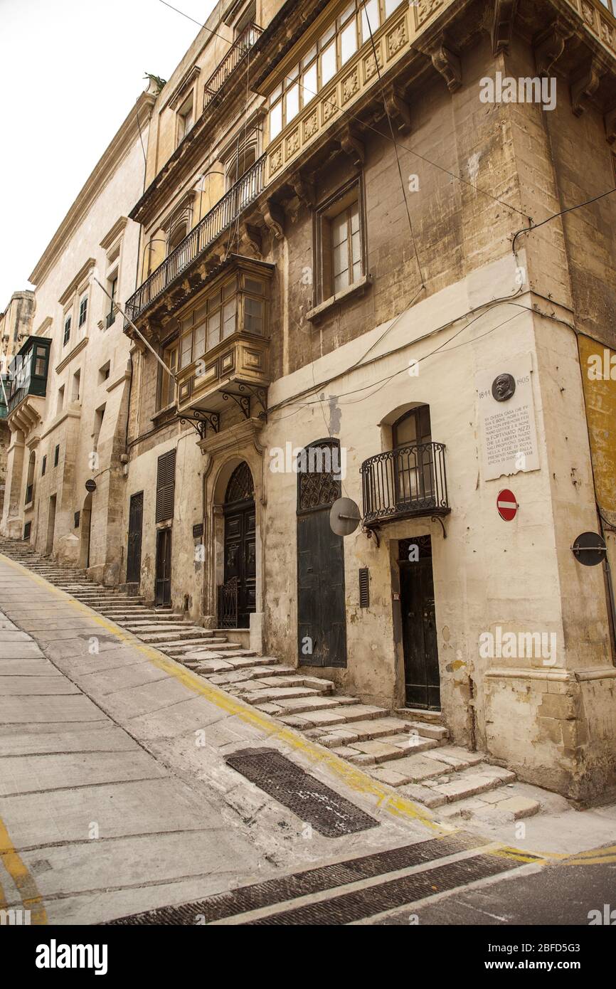 building and architecture of  the side streets of Valletta the capital city of malta Stock Photo