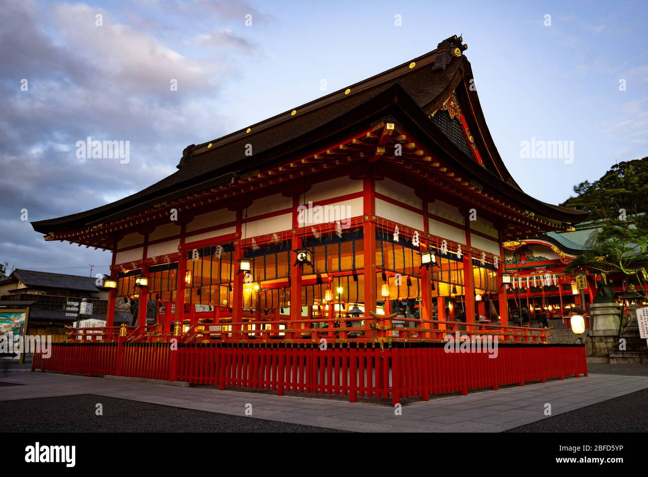 Fushimi Inari-Taisha Shrine is known worldwide as one of the most iconic sights in Kyoto, Japan. More than 1300 years historical building. Stock Photo