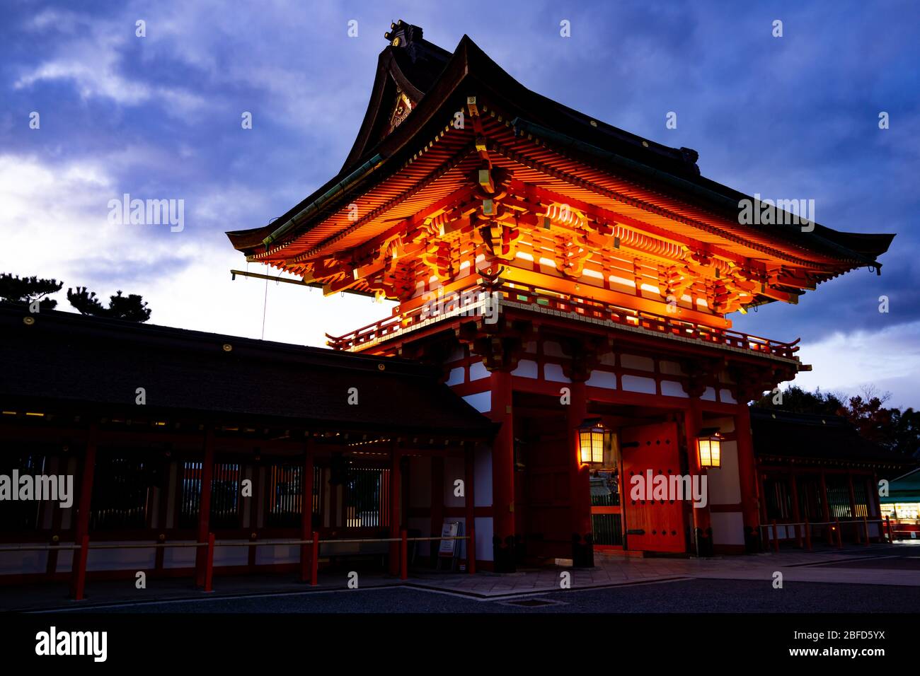 Fushimi Inari-Taisha Shrine is known worldwide as one of the most iconic sights in Kyoto, Japan. More than 1300 years historical building. Stock Photo