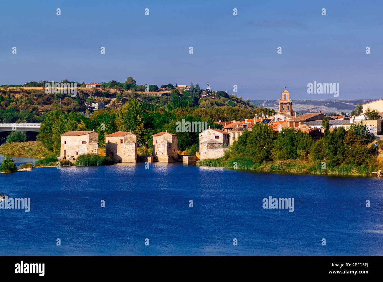 View of the water mills 'Aceas de Olivares', old town and Douro river. Zamora, Spain. Stock Photo
