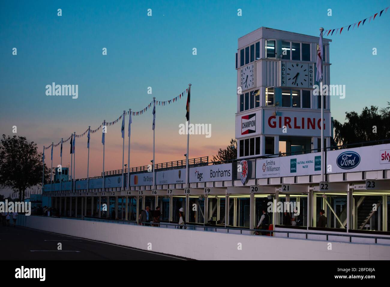 Goodwood Pit Lane at Sunset with the Rolex Girling Clock Tower ...