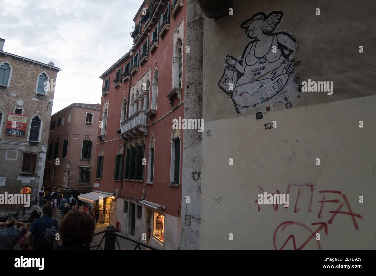 A stencil protesting against the high number of tourist in Venice Stock Photo