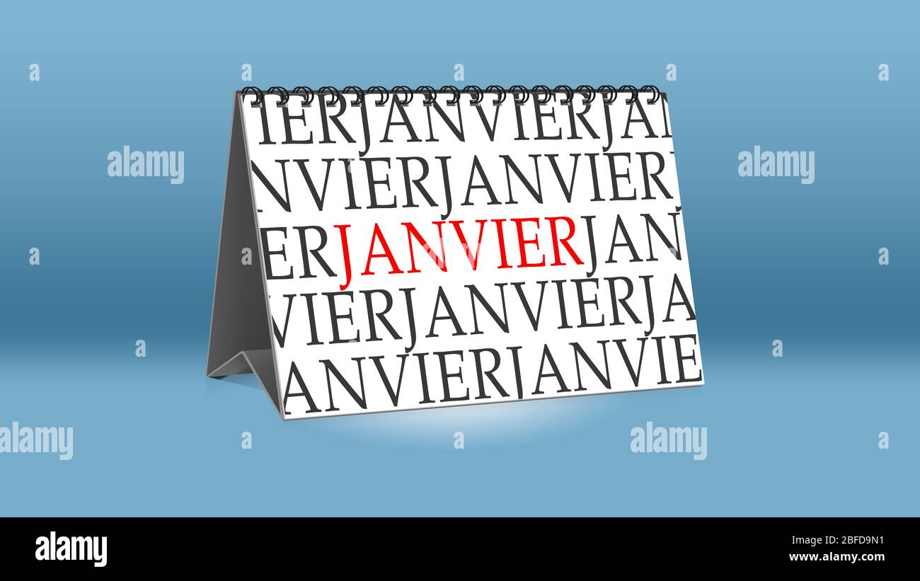 A calendar for the desk shows the French month of Janvier (January in English language) Stock Photo