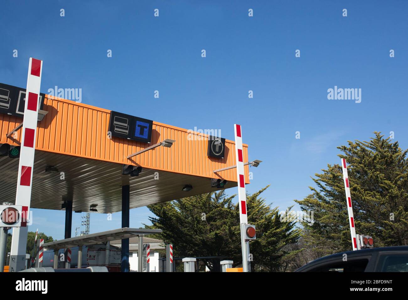 Payment system signals by credit card at highway toll gate. Daylight shot Stock Photo