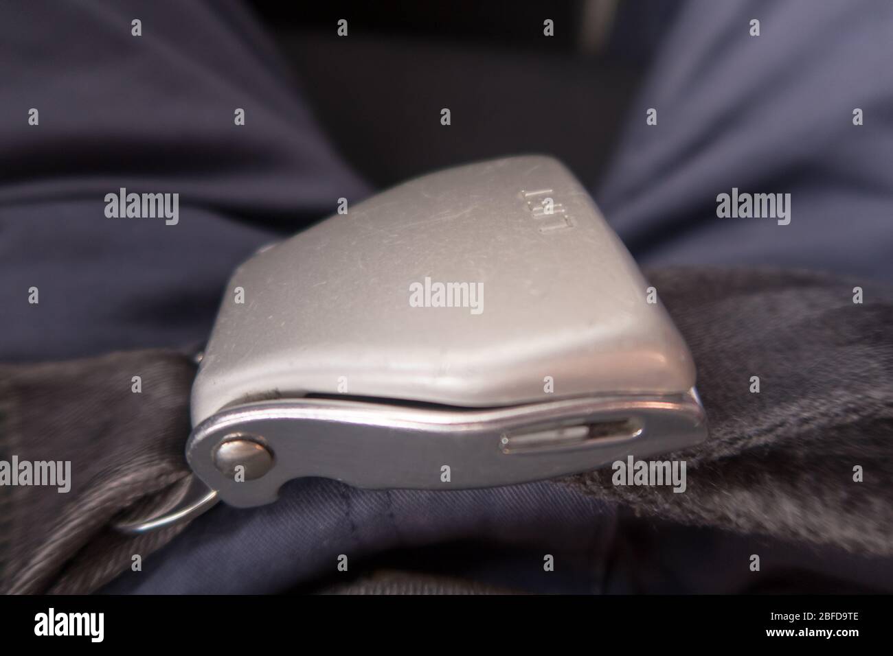 Airplane seat belt hi-res stock photography and images - Alamy