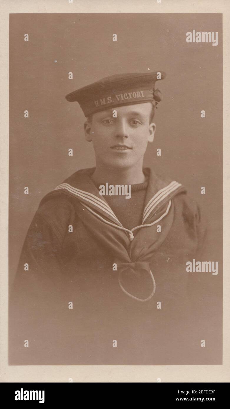 Vintage Photographic Postcard Showing a British Navy Sailor From H.M.S.Victory. Stock Photo