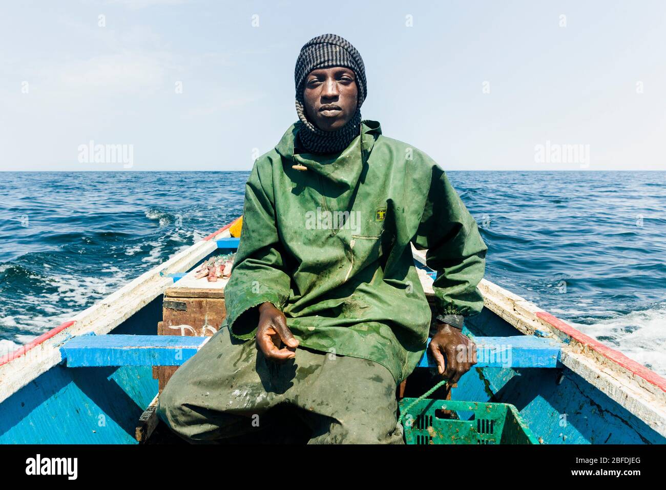 Green fishing overalls hi-res stock photography and images - Alamy