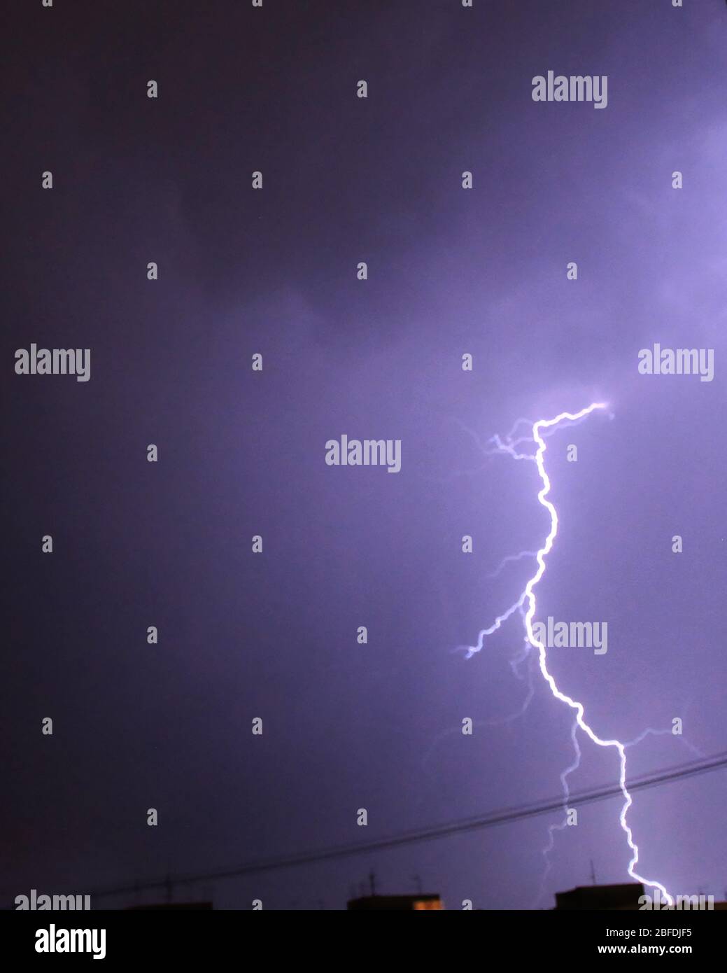 Thunder in the city. Natural phenomenon. Stock Photo