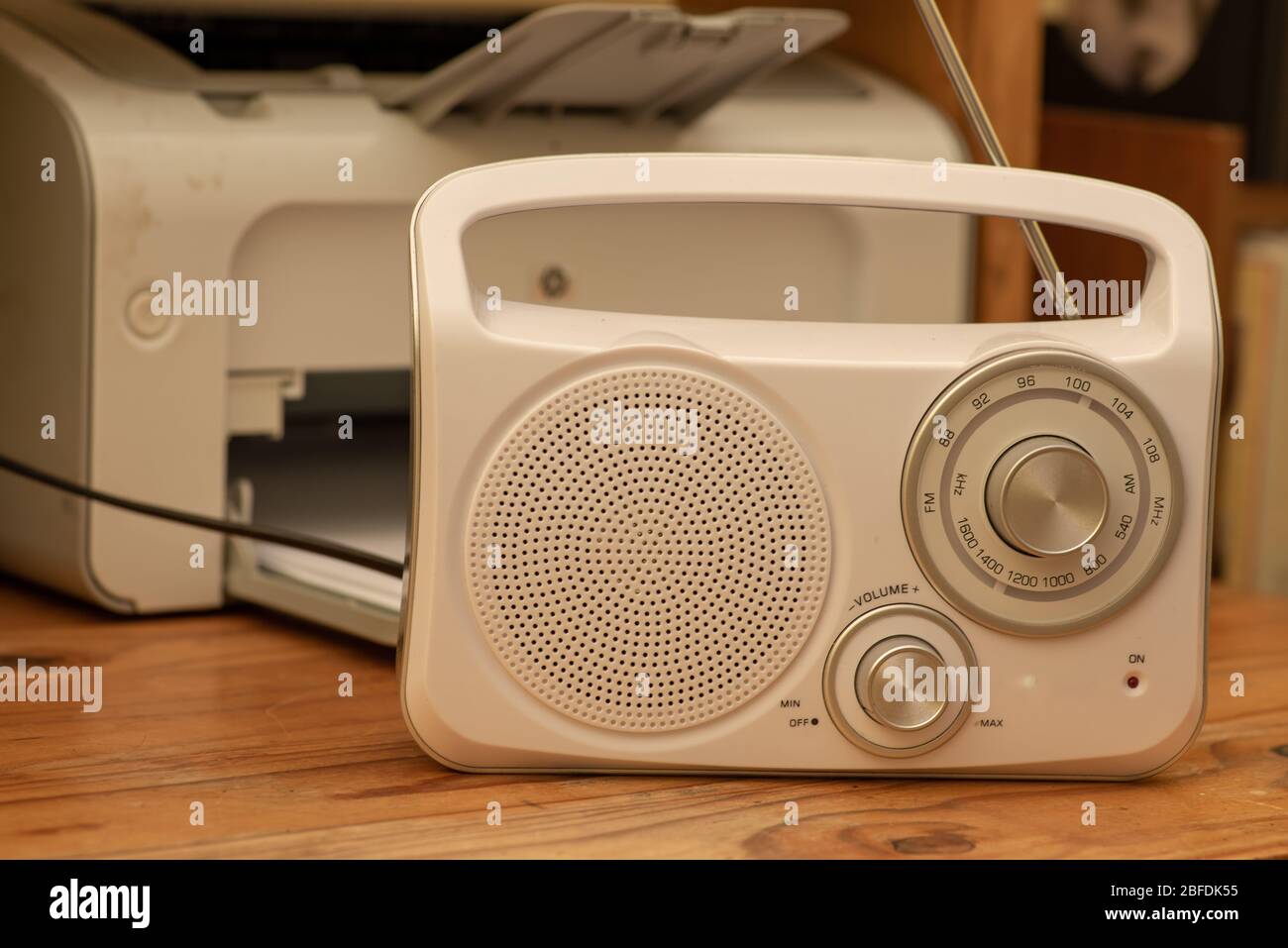 Retro styled radio on wooden desk Stock Photo Alamy