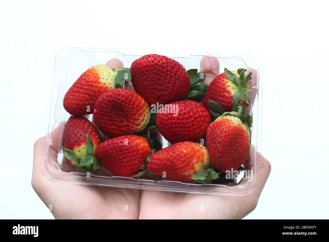 Close up of fresh strawberries isolated against white background Stock ...