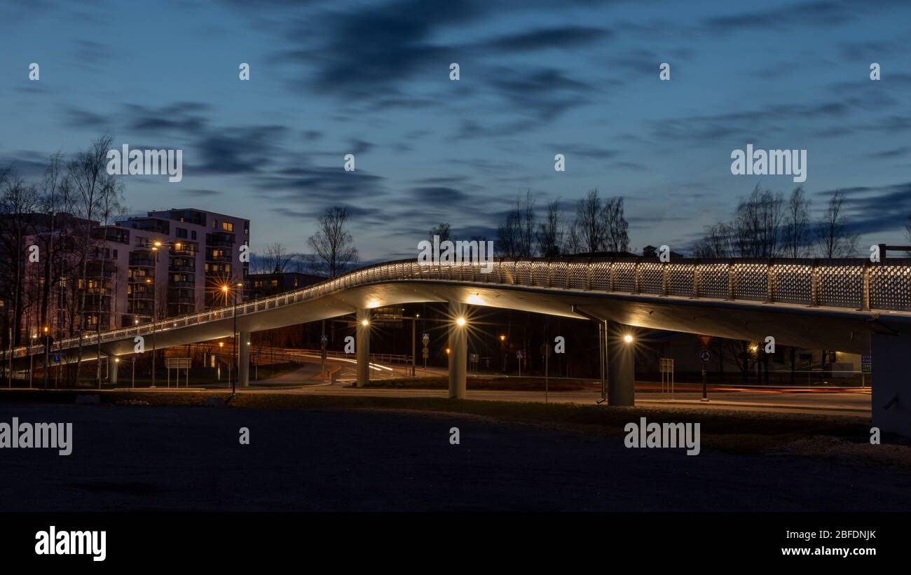 Finnish residential neighbourhood and pedestrian bridge in Espoo Stock Photo