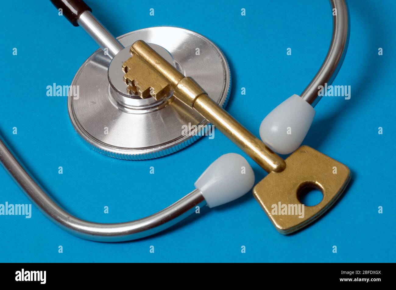 Set against a blue background the doctor’s stethoscope is compared with