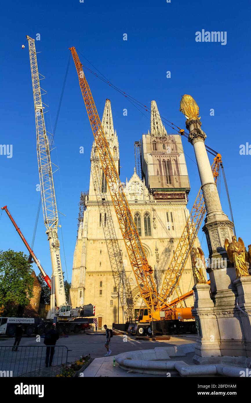 Zagreb, Croatia - April 17, 2020 : Workers have successfully lowered the top of the Zagreb Cathedral witch was damaged by the earthquake witch hit Zag Stock Photo