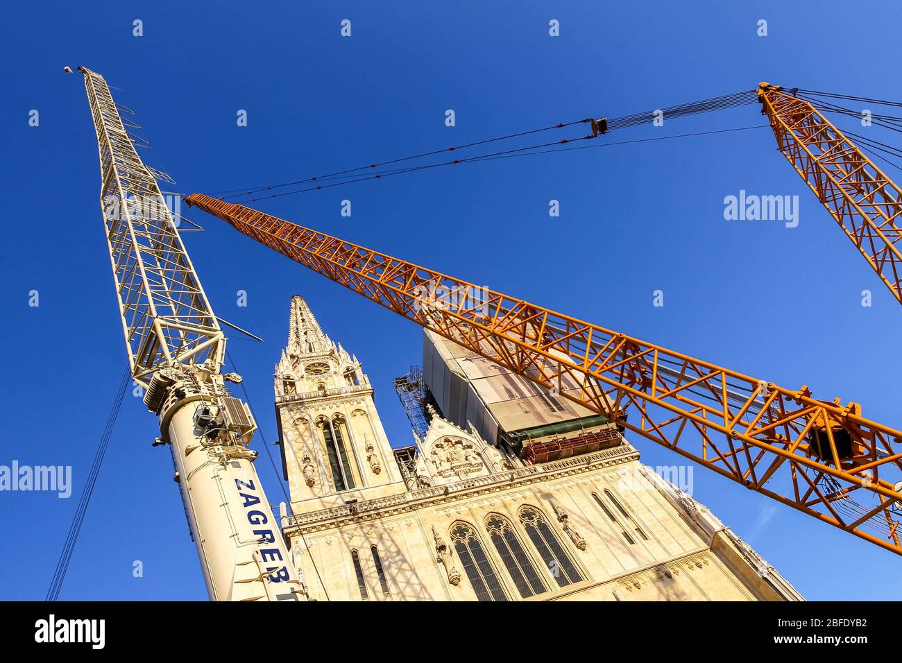 Zagreb, Croatia - April 17, 2020 : Workers have successfully lowered the top of the Zagreb Cathedral witch was damaged by the earthquake witch hit Zag Stock Photo