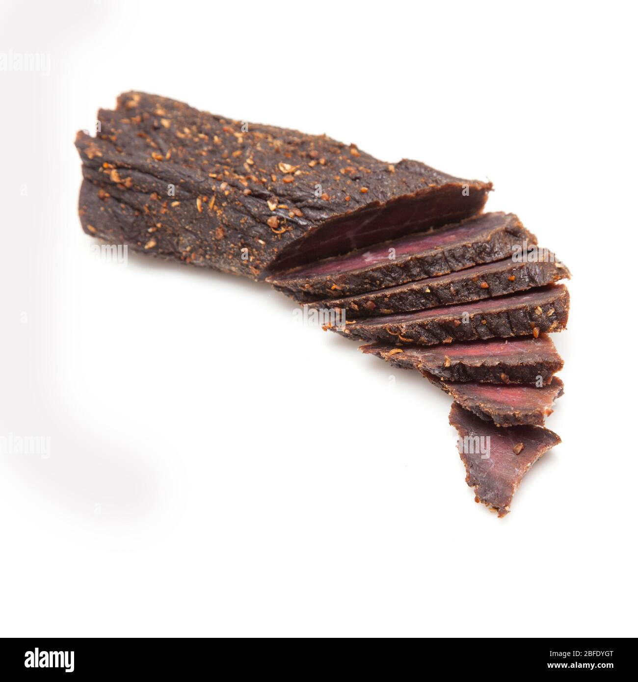 Beef Biltong, South African Beef Jerky isolated on a white studio
