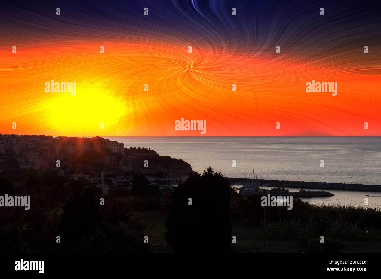 sunset over ocean at tropea italy with modern twirl effecr applied Stock Photo