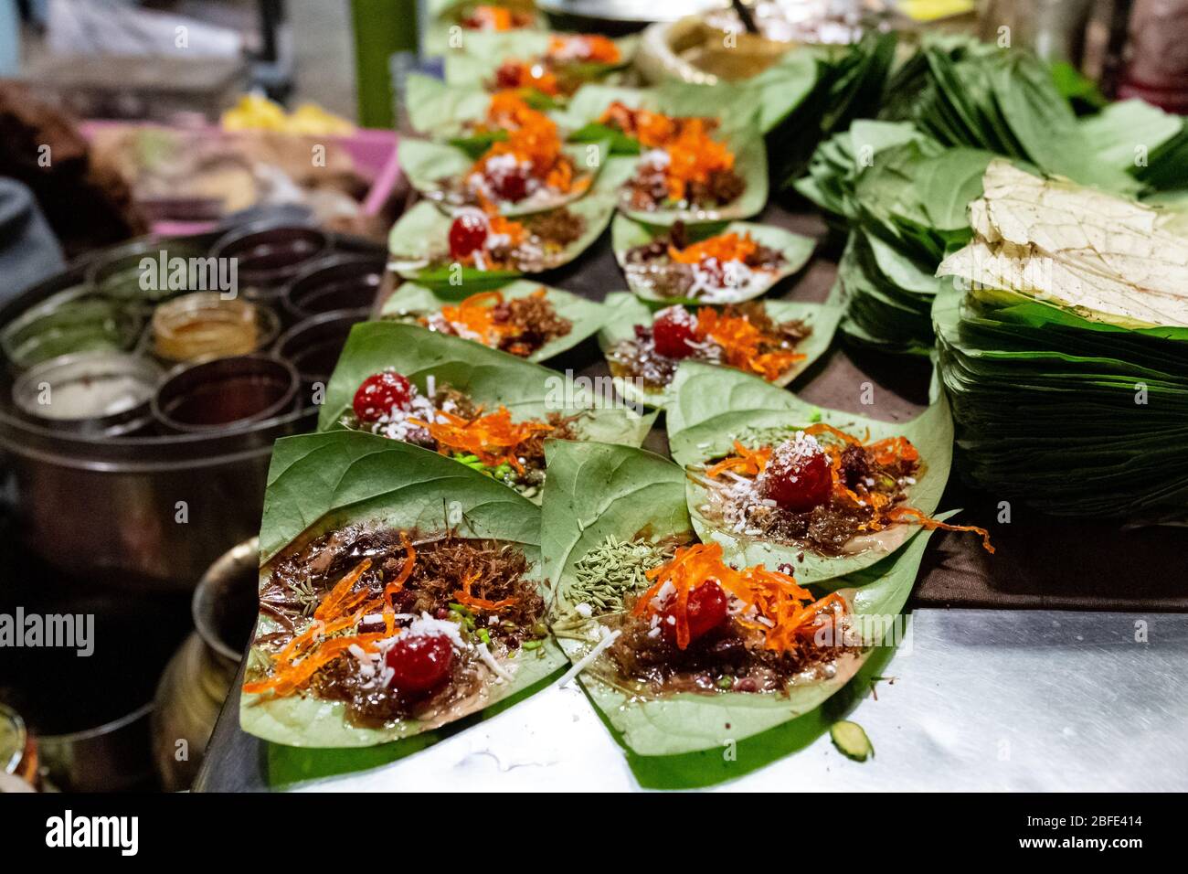Paan prepared of betel leaf combined with areca or tobacco Stock Photo