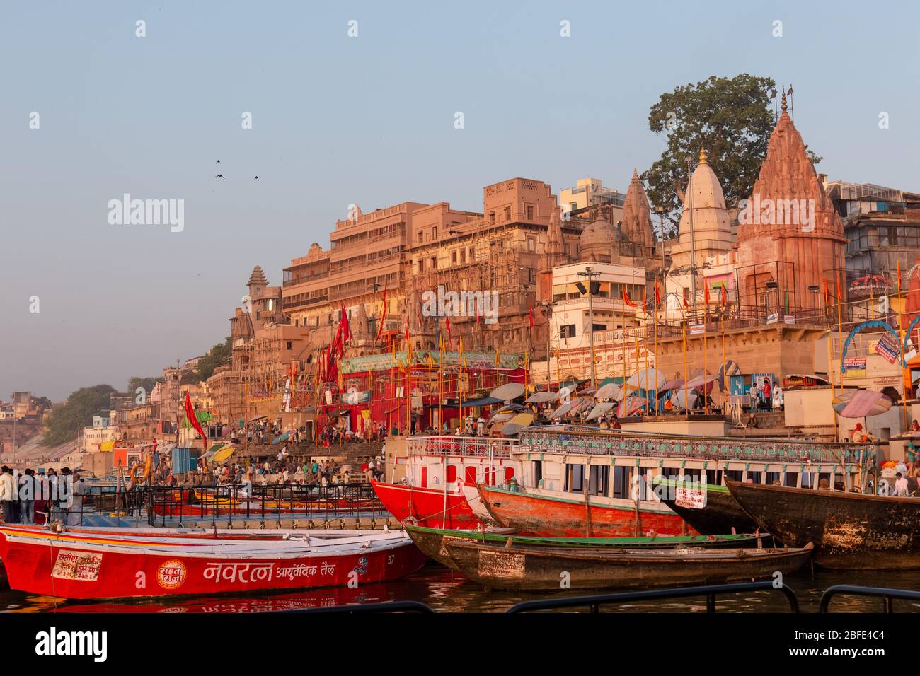 Varanasi Ghats. Colorful Dasashwamedh ghat with Boats in river Ganges ...