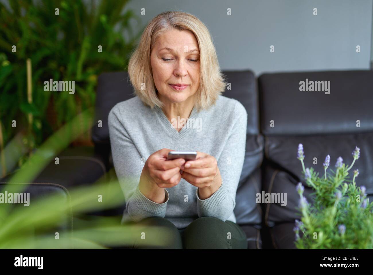 Beautiful single mature woman hi-res stock photography and images - Alamy