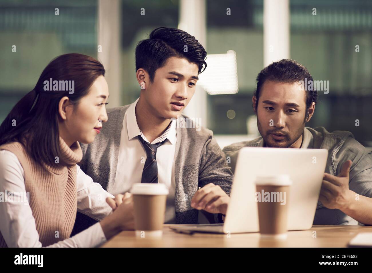 Team company working with computer hi-res stock photography and images ...