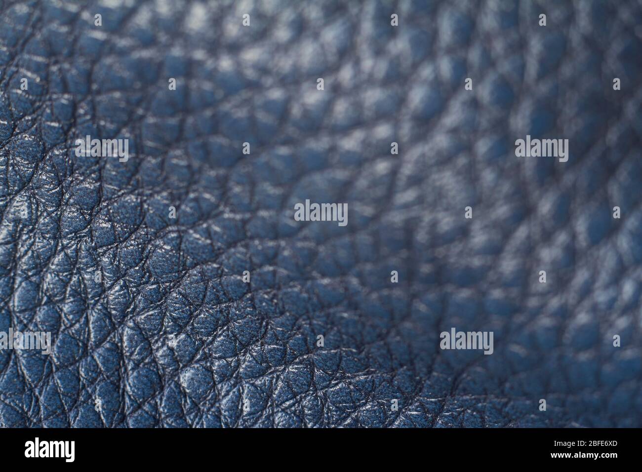 Extremely close-up natural qualitative blue leather texture, selective focus Stock Photo