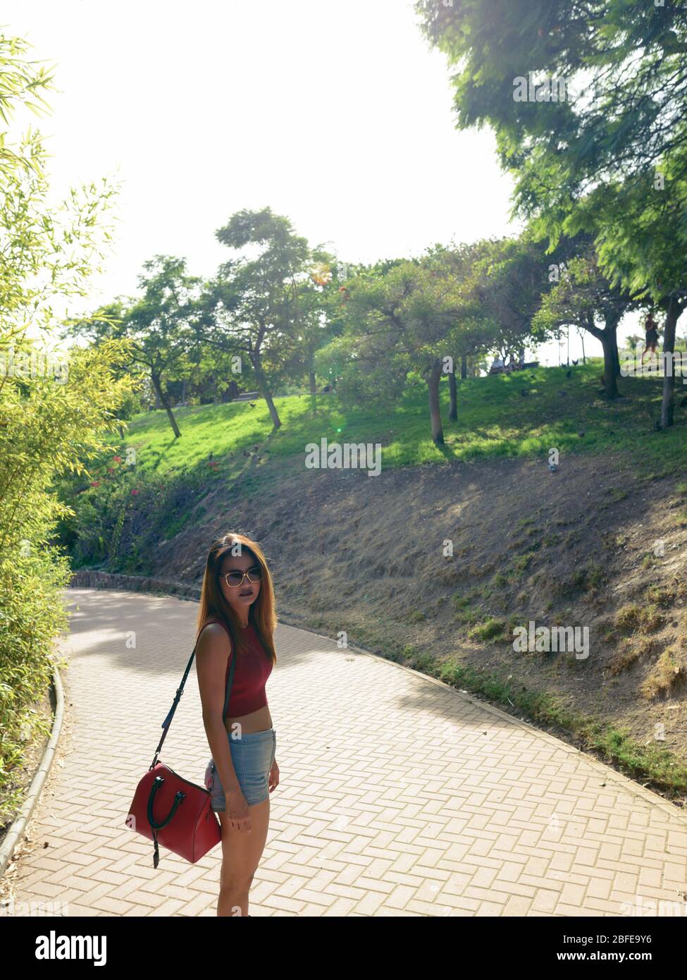 Beautiful asian woman standing in hi-res stock photography and images ...