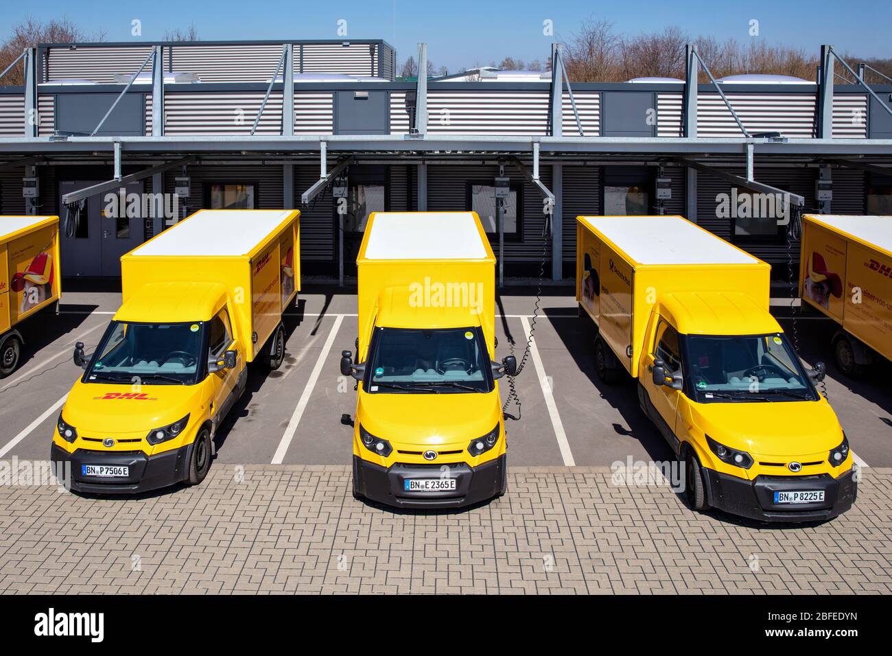 StreetScooter Work at Deutsche Post DHL depot. Stock Photo