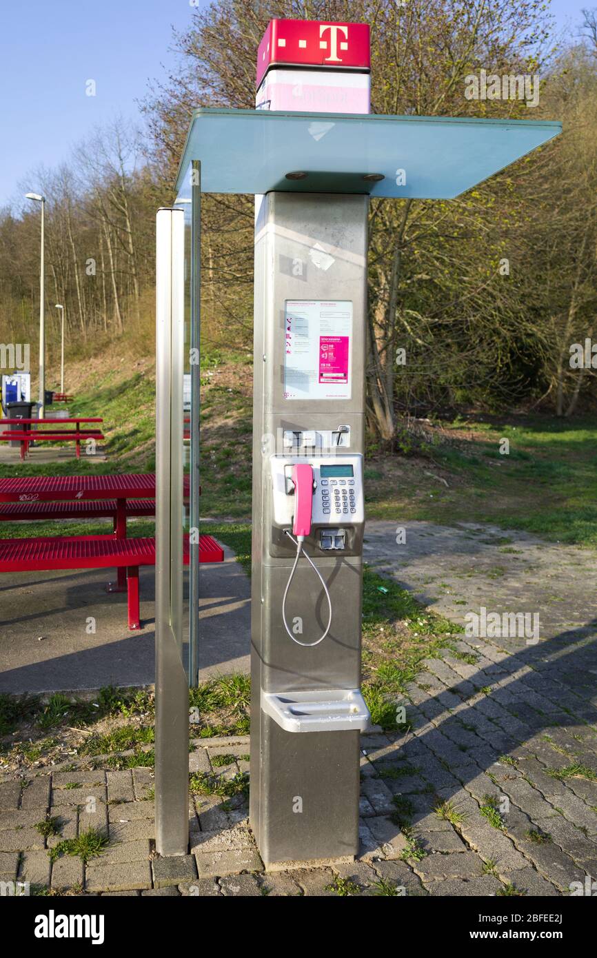Telephone booth of Deutsche Telekom. Deutsche Telekom AG is a German telecommunications company and a component of the Euro Stoxx 50 index. Stock Photo