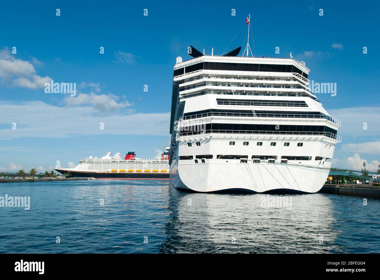 The View Of Moored Cruise Liner And A New Cruise Ship Arriving To Nassau City Bahamas Stock Photo Alamy