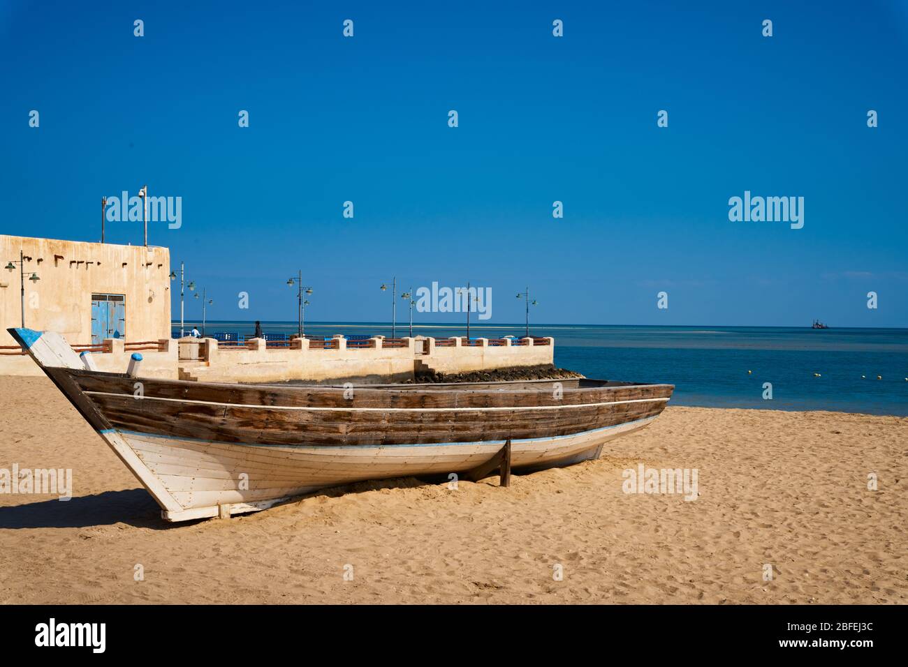 traditional arabic boat on the beach of Al Wakrah souk landmark of Qatar Stock Photo