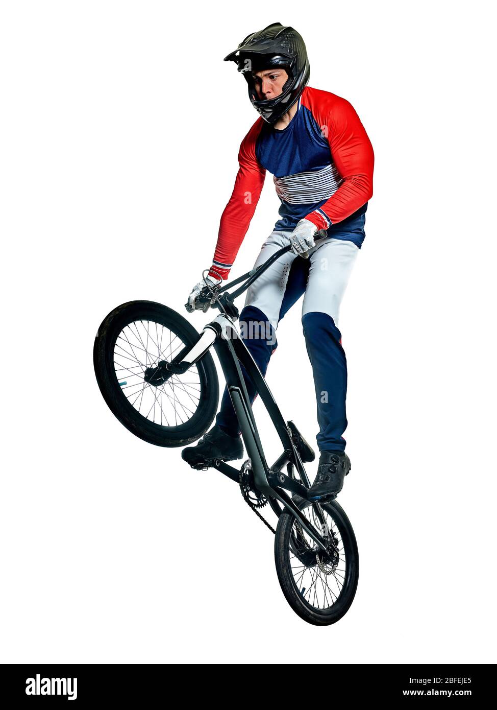 one caucasian BMX racer jumping in studio silhouette isolated on white