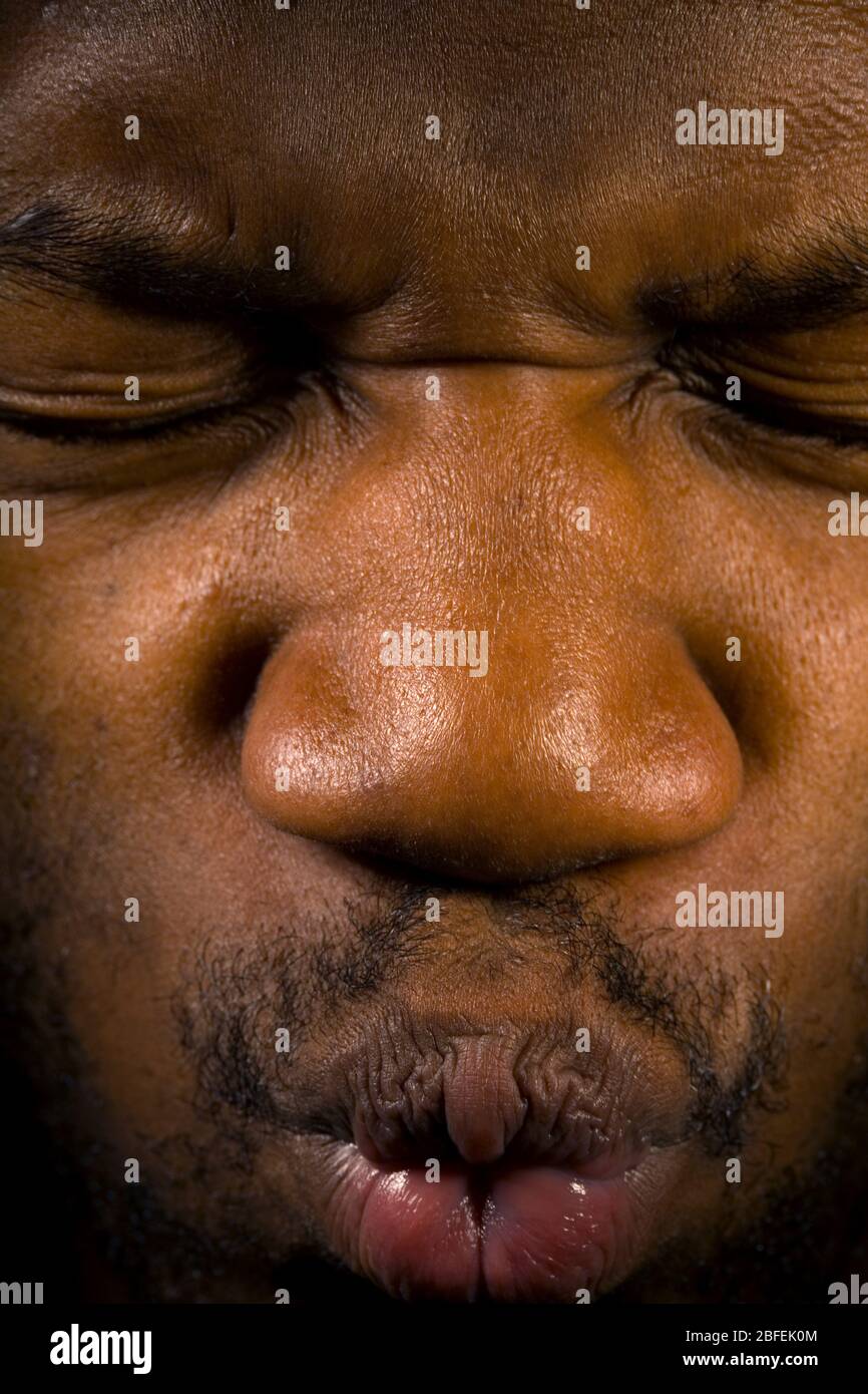 Eyes tight shut hi-res stock photography and images - Alamy