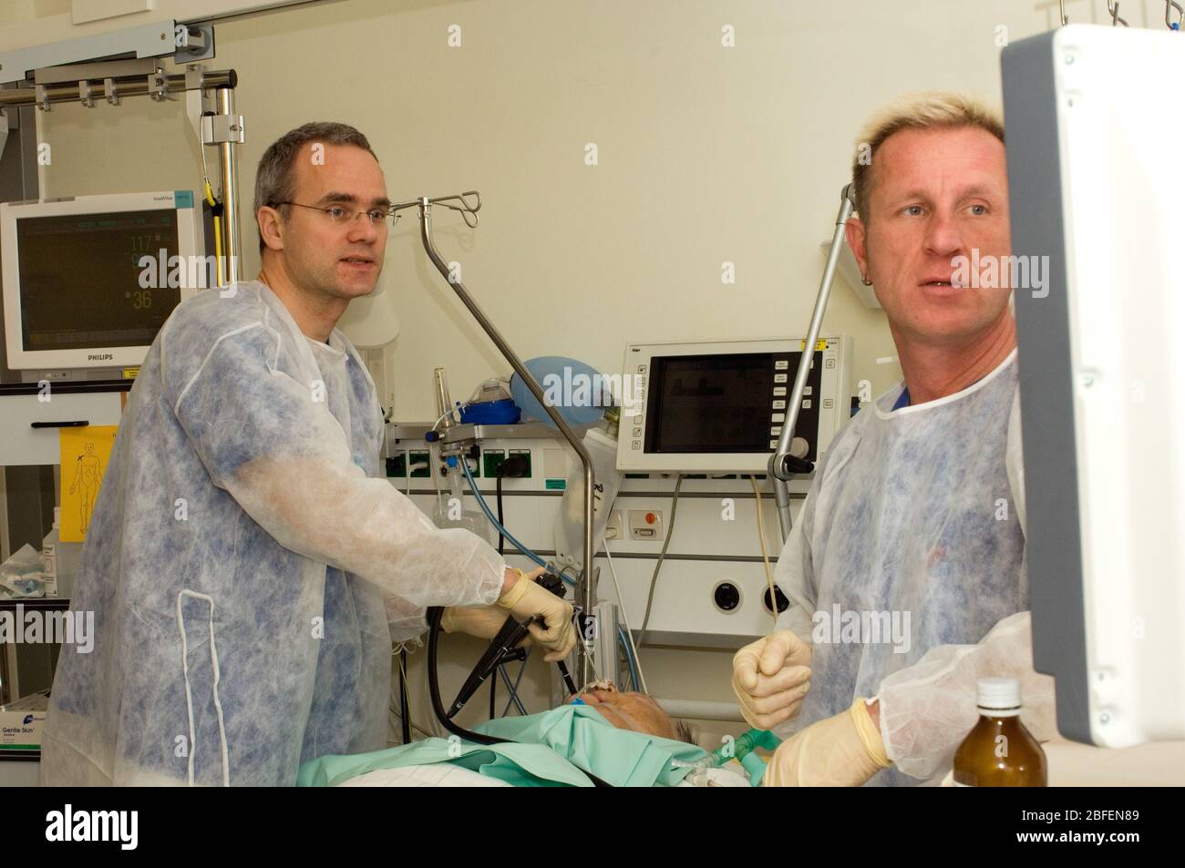 Doctors perform an endoscopic examination on a patient Stock Photo Alamy
