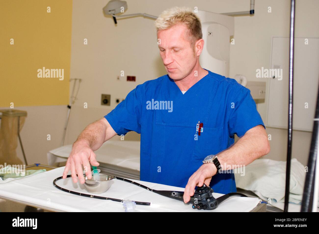 Doctor prepares endoscope for use Stock Photo - Alamy