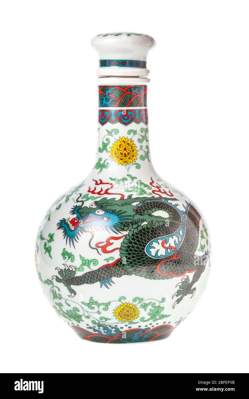 MOSCOW, RUSSIA - APRIL 4, 2020: closed ceramic bottle of chinese strong alcoholic drink baijiu with traditional ornament on white background Stock Photo