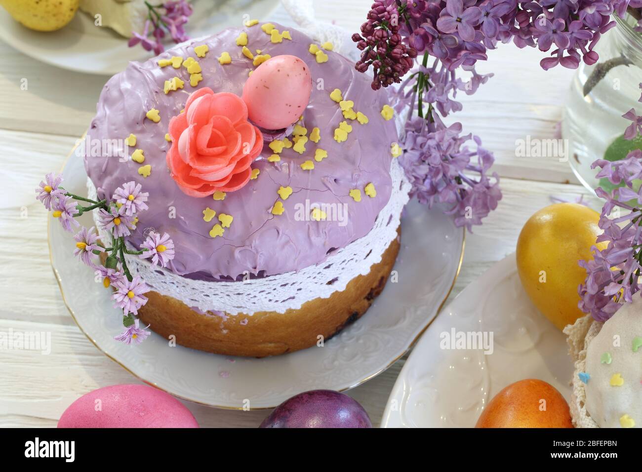 Still life with Easter cakes and lilacs Stock Photo - Alamy