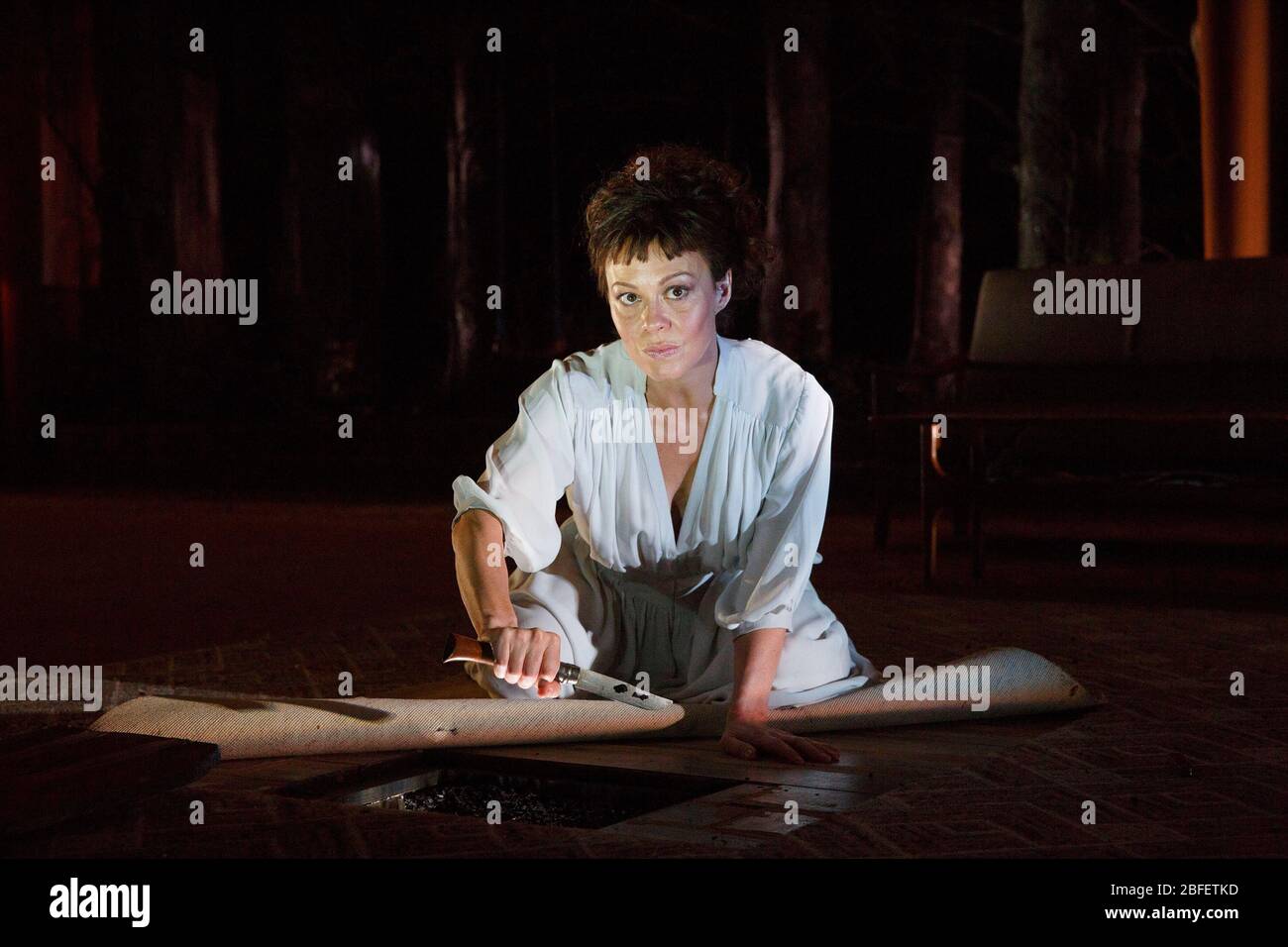 Helen McCrory (Medea) in MEDEA by Euripides at the Olivier Theatre, National Theatre (NT), London in 2014 in a new version by Ben Power design: Tom Scutt lighting: Lucy Carter director: Carrie Cracknell Stock Photo