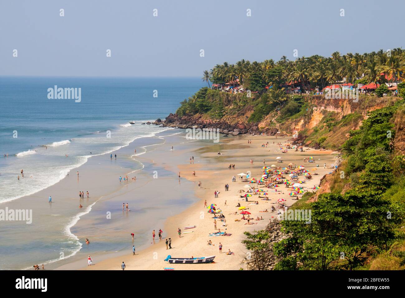 domestic and forign tourists enjoying in the beaches of papanasam,varkala,thiruvananthapuram,kerala,india,pradeep subramanian,beach tourism,papanasam Stock Photo
