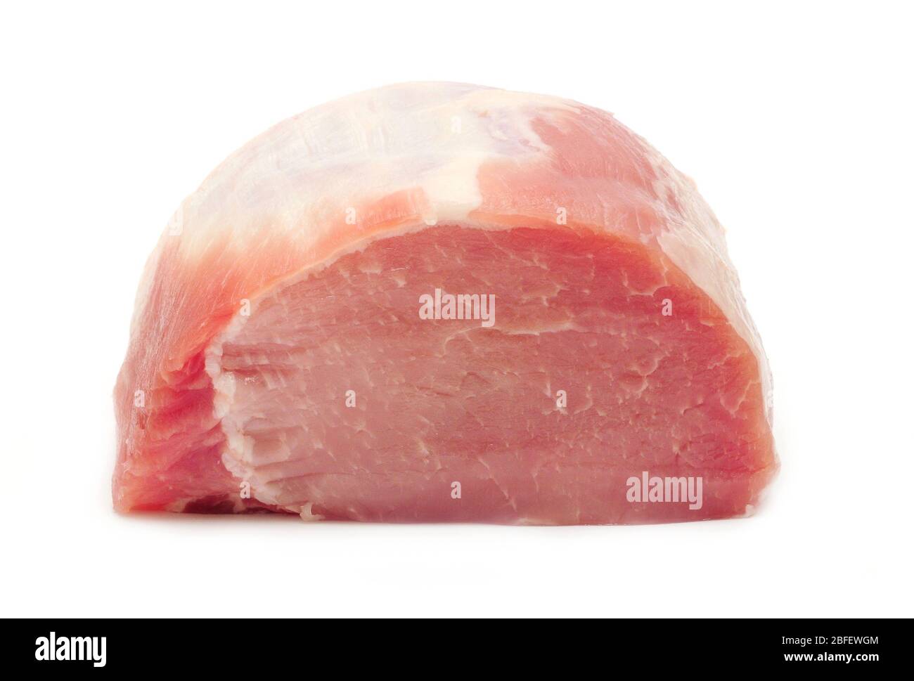 Whole piece of fresh raw pork loin over white background. Stock Photo