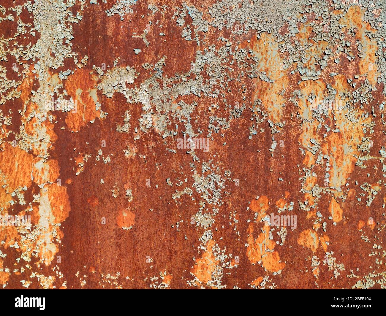 Rusted grey painted metal wall. Rusty metal background with streaks of ...