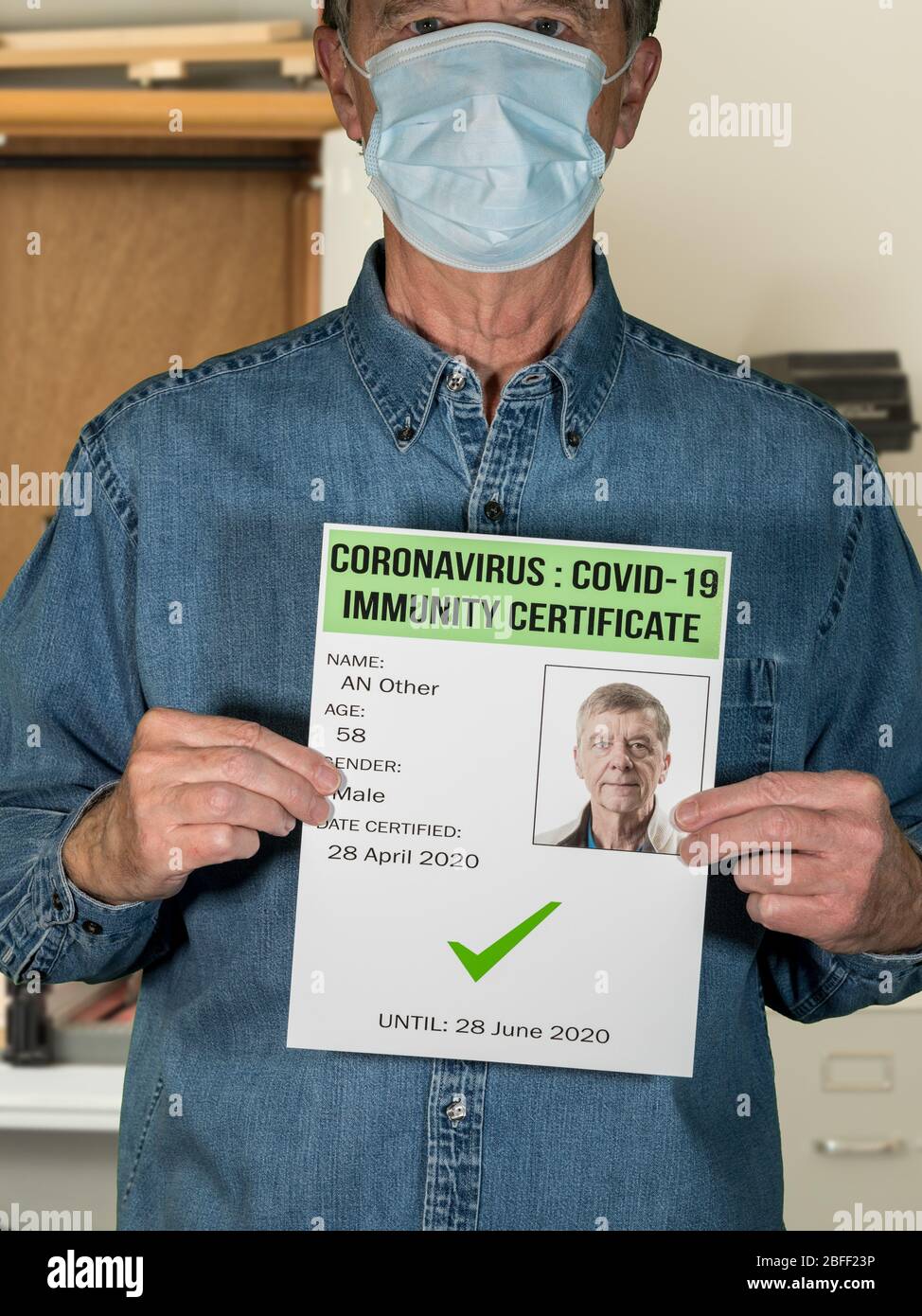 Male blue collar worker concept of immunity testing and certification to allow people to go back to work after negative test Stock Photo