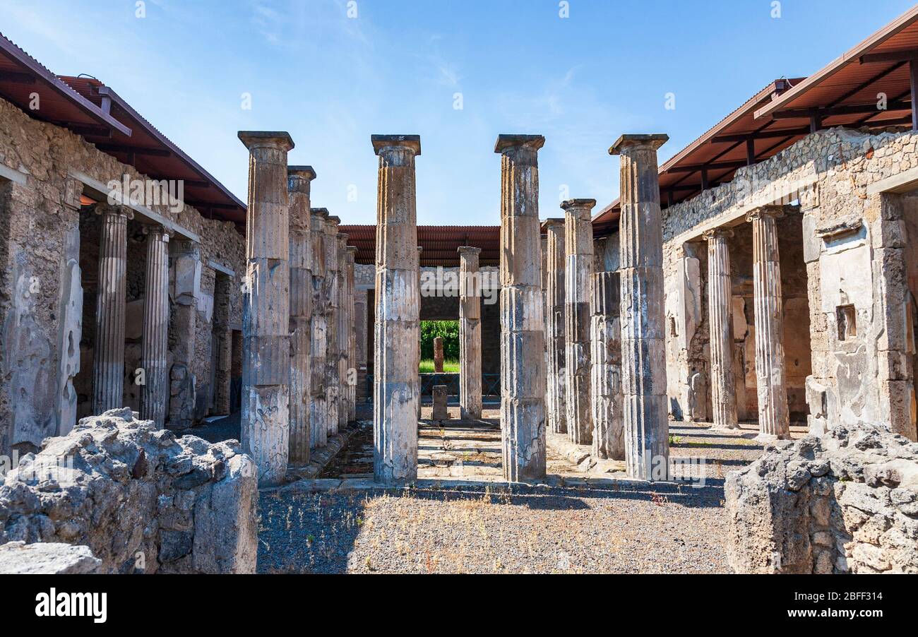 Doric columns in the Atrium of the House of M. Epidius Rufus in Roman Pompeii, Italy Stock Photo